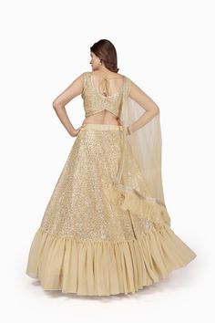 For mesmerizing looks, you'll be head over heels for this Cream Georgette lehenga choli set. Crafted with multi sequins embroidery work, this set is designed with a 4-meter flair, soft net dupatta and regular sleeve blouse with round neck. Floor length lehenga comes with a soft net dupatta, and customizations are available. Be ready to dazzle in this gorgeous ensemble! (Oh, and don't forget to dry clean!) No of Set - 3-piece set Color- Cream Lehenga Choli Fabric - Georgette Stitch Type - Semi-St Lehenga For Sangeet, Cream Lehenga, Lehenga Type, Sequins Lehenga, Georgette Lehenga, Lehenga Fabric, Choli Blouse, Work Lehenga, Anarkali Kurta