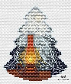 the cross stitch pattern shows an image of a lit candle with trees in the background