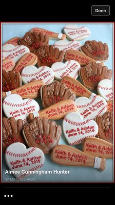 some baseball themed cookies are on a table