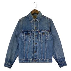 "PLEASE READ THE DESCRIPTION DON'T BE SHY TO ASK ANY QUESTION :-WE DO COMBINE SHIPPING. WE ONLY SHIP VIA EXPRESS SHIPPING WORLDWIDE. HAPPY SHOPPING WITH US. - [x] Brand :- Levi's - [x] Size On Tag :- RECOMMENDED SIZE : (Please refer to manual measurement) - [x] MADE IN : CANADA - [x] MATERIAL : - ( Please refer pictures attached) - [x] Please see the actual measurements :-(All measurements were taken lying flat) - [x] Actual size Manual Measurement (approximately) : UNDERARM TO UNDERARM (PIT TO Retro Relaxed Fit Denim Blue Outerwear, Retro Long Sleeve Denim Outerwear, Retro Medium Wash Relaxed Fit Outerwear, Retro Relaxed Fit Medium Wash Outerwear, Classic Light Wash Long Sleeve Denim Jacket, Vintage Long Sleeve Denim Jacket For Spring, Retro Denim Jacket With Pockets, Retro Long Sleeve Denim Jacket With Pockets, Retro Light Wash Long Sleeve Outerwear