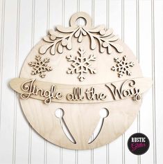 a wooden sign that says, jingle all the way with snowflakes on it