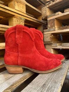 Candy Apple Red Suede Ankle Boot Pull On Style Padded Footbed 1.5 Inch Wood Block Heel Round Toe 7 Inch Shaft & Circumference We Also Carry These In Black, Navy, Sand & Whiskey Suede Leather Runs True ***PREORDER DATES are subject to change, as these are "made to order" shoes. If you choose to cancel your PREORDER you will receive a STORE CREDIT, as we do not offer refunds! ***These are shipped to you directly from our Manufacturer. Please allow 7-10 business days for shipping/tracking notificat Dan Post Boots, Boot Pulls, Candy Apple Red, Apple Red, How To Hem Pants, Candy Apple, Wedge Heel Sandals, Capri Blue, Loungewear Sets