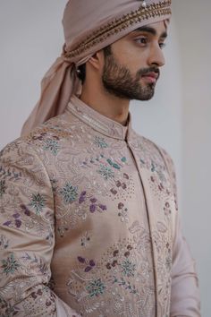 Editor's Note Featuring Our Work Of Art In Our Blush Pink Heavy Hand-embroidered Sherwani Set, With A Kaleidoscopic Floral Pattern Scattered All Over The Ensemble. Completing The Look With A Double-bordered Handmade Safa, And A Matching Blush Pink Hand-embroidered Stole. Paired With The New Jmc Accessories- Double Strap Tan Peshawari, And The Metal Kalgi. Fabric: Linen Silk Color: Blush Pink Component: Sherwani, Kurta, Churidar, Stole, Safa Care: Dry Clean Only About the Designer After establish Jatin Malik, Indian Groom Dress, Indian Wedding Clothes For Men, Sherwani For Men Wedding, Embroidered Sherwani, Indian Groom Wear, Sherwani Groom, Kids Ethnic Wear, Boho Crafts Diy