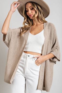 Kimono style slouchy cardigan with short dolman sleeves made in knit fabric. Also available in avocado. 65% Acrylic 35% Nylon Short Sleeve Cardigan Outfit, Cardigan With Shorts, Cocoon Sweater, Slouchy Cardigan, Flannel Tops, Pocket Cardigan, Short Sleeve Cardigan, Kimono Style, Fashion Weeks