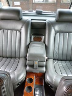 the interior of a car with leather seats