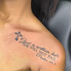 a woman with a cross tattoo on her chest saying god is within her she will not fail him