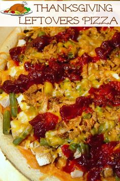 thanksgiving leftovers pizza with turkey and cranberry sauce