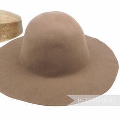 This mushroom wool felt capeline hat body is made from 100% thick Australian wool and has been stiffened to help in the hat blocking process. Great for making fascinators and hats from scratch the traditional way. Capeline Measures approx.: 2.5-3mm thick Flat measurement 28x46cm (11x18.1 inches) Weight: 120g Brim width from side crown to brim edge: 8-10cm (3.1-3.9 inches) Stiffener: 1 degree shellac stiffener. Some colourways are stiffer than others, but all block up wonderfully! *Please note th Wool Brimmed Felt Hat, Adjustable Wide Brim Felt Cloche Hat, Wool Felt Hat With Curved Brim, Solid Wool Fedora Hat, Beige Fur Felt Brimmed Hat, Beige Brimmed Wool Felt Hat, Curved Brim Felt Hat, Curved Brim Felt Hat, One Size Fits Most, Solid Felt Hat With Curved Brim