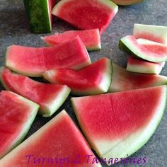 slices of watermelon are cut into wedges