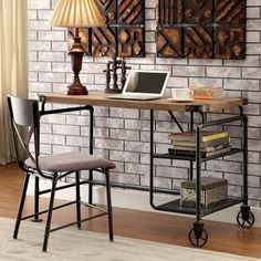 a computer desk with a laptop on top of it next to a chair and lamp