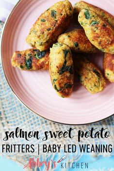 salmon patties on a pink plate with the title above it that reads, salmon sweet potato fritters baby led weaning