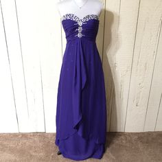 Beautiful Gown Perfect For Any Special Occasion Beaded Evening Dress For Prom Season, Prom Season Beaded Gown, Beaded Prom Gown For Prom Season, Beaded Gown For Prom Season, Beaded Evening Dress With Fitted Bodice For Prom, Beaded Gown With Fitted Bodice For Prom, Beaded Gown For Prom, Purple Embellished Evening Dress With Sweetheart Neckline, Crystal Embellished Maxi Dress For Prom