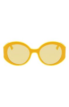 A retro-chic silhouette brings throwback style to scene-stealing sunglasses agleam with logo-etched accents at the temples. 53mm lens width; 20mm bridge width; 140mm temple length 100% UV protection Plastic Imported Retro Round Frame Sunglasses With Mirrored Lenses, Retro Yellow Sunglasses With Uv Protection, Retro Yellow Sunglasses With Gradient Lenses, Retro Sunglasses With Tinted Round Frame, Retro Round Frame Sunglasses With Tinted Lenses, Retro Yellow Sunglasses With Mirrored Lenses, Trendy Yellow Round Frame Sunglasses, Yellow Sunglasses With Gradient Lenses And Round Frame, Beauty Advice