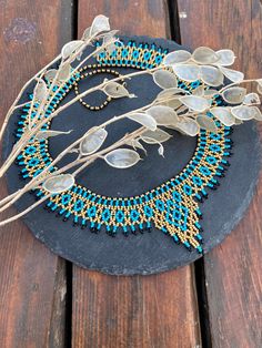 Artisan beaded necklace, collar necklace, boho necklace, seed bead necklace, folk necklace,beaded choker,ornament necklace,designer necklace ♥𝑀𝑎𝑑𝑒 𝑢𝑠𝑖𝑛𝑔 𝑓𝑟𝑒𝑒ℎ𝑎𝑛𝑑 𝑏𝑒𝑎𝑑𝑖𝑛𝑔 𝑤𝑜𝑣𝑒𝑛 𝑡𝑒𝑐ℎ𝑛𝑖𝑞𝑢𝑒𝑠 𝑤𝑖𝑡ℎ 𝑠𝑡𝑟𝑜𝑛𝑔 𝑠𝑦𝑛𝑡ℎ𝑒𝑡𝑖𝑐 𝑡ℎ𝑟𝑒𝑎𝑑. ♥𝑇ℎ𝑒 𝑠𝑖𝑧𝑒 𝑜𝑓 𝑡ℎ𝑒 𝑠𝑒𝑒𝑑 𝑏𝑒𝑎𝑑𝑠 𝑢𝑠𝑒𝑑 𝑖𝑠 2 𝑚𝑖𝑙𝑙𝑖𝑚𝑒𝑡𝑒𝑟𝑠 𝑎𝑛𝑑 𝑏𝑒𝑎𝑑𝑠 𝑎𝑟𝑒 ℎ𝑖𝑔ℎ 𝑞𝑢𝑎𝑙𝑖𝑓𝑖𝑒𝑑. ♥𝐴𝑙𝑙 𝑡ℎ𝑒 ℎ𝑜𝑜𝑘𝑠 𝑢𝑠𝑒𝑑 𝑖𝑛 𝑜𝑢𝑟 𝑗𝑒𝑤𝑒𝑙𝑟𝑦 𝑎𝑟𝑒 24 𝑘 𝑔𝑜𝑙𝑑 𝑝𝑙𝑎𝑡𝑒𝑑 𝑎𝑛𝑑 ℎ𝑦𝑝𝑜𝑎𝑙𝑙𝑒𝑟𝑔𝑒𝑛𝑖𝑐. ♥𝑇ℎ𝑒𝑠𝑒 𝑎𝑟𝑒 𝑣𝑒𝑟𝑦 𝑙𝑖𝑔ℎ𝑡 𝑒𝑎𝑟𝑟𝑖𝑛𝑔𝑠 𝑡ℎ𝑎𝑡 𝑦𝑜𝑢 𝑐𝑎𝑛 𝑤𝑒𝑎𝑟 𝑎𝑙𝑙 𝑑𝑎𝑦 𝑤𝑖𝑡ℎ𝑜𝑢𝑡 ℎ𝑢𝑟𝑡𝑖𝑛𝑔 𝑦𝑜𝑢! What if you want to have an jewelry suitable for every kind of clothing style? Use it with a white t-shirt, be 𝙛𝙧𝙚𝙨? Bohemian Choker With Round Beads And Bead Caps, Bohemian Necklaces With Bead Caps And Round Beads, Bohemian Necklaces With Bead Caps, Bohemian Necklaces With Bead Caps For Festivals, Bohemian Beaded Necklaces With Bead Caps For Festivals, Bohemian Turquoise Necklaces With Bead Caps, Bohemian Turquoise Necklace With Bead Caps, Ornament Necklace, Beading Netting