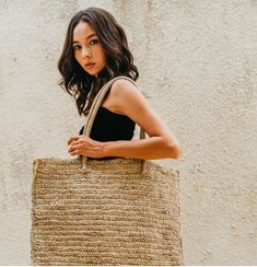 This lovely handmade oversize beach tote made with superior quality raffia and is ideal for everyday use or lounging around at the beach. Matching this oversize tote with a dress and sandals completes the overall look for a fun day out. Handmade by our balinese artisans. Size: 19.75"l x 16.50"h x 6.25"d. (50cm l x 42cm h x 16cm d). Material: raffia. Unlined Dress And Sandals, Oversized Tote, Fun Day, Beach Tote, Balinese, A Dress, At The Beach, The Beach, Fashion Accessories