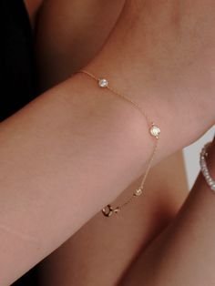 Editor's NotesDelicate and Sophisticated fine jewelry from BARA DU will add a charm to your outfit.- Cubic Zirconia setting Bracelet- Cable gold chain- Luxurious and elegant style- High polished textureMeasurement (in.)Cubic:  0.15”Length:- 5.9” - 6.3”- 6.3” - 6.7”- 6.7”-7.1”- 7.1”- 7.5”Composition & Care- 14K Gold Plated, CZ- Avoid direct heat and moisture- Wipe with a dry cloth when wet- Store in a sealed bag when not in useDesigner- by BARA DU Dainty Bezel Set Chain Bracelet, Cubic Zirconia Gold Bracelet With Bezel Setting, Elegant Everyday Round Crystal Bracelet, Elegant Everyday Crystal Bracelet, Minimalist Bezel Set Bracelet Jewelry, Minimalist Bracelet With Bezel Setting, Adjustable Dainty Jewelry With Brilliant Cut, Minimalist Cubic Zirconia Bracelets With Bezel Setting, Minimalist Cubic Zirconia Bracelet With Bezel Setting