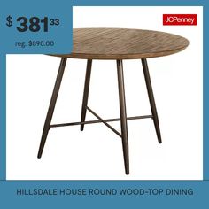 a round table with wood top and metal legs for $ 38 13 reg $ 39 00