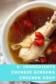 a white bowl filled with chicken soup on top of a table