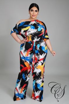 Add some fresh prints to your look with this jumpsuit. Featuring an abstract print, stretchy fabric, boat neckline, midi sleeves, wide bottoms, self tie waist belt, no closures. We are totally obsessed. Team this with a pair of mules and complete the look with a mini bag. Model is wearing a 2X Fabric: 95% Polyester 5% Spandex Hand wash cold, line dry. Do not bleach, iron or dry clean. Size Chart *Restock Notice: Garcelle Abstract Print One Shoulder Jumpsuit will restock Wednesday July 14, 2021 African Jumpsuits For Women Plus Size, Jumpsuit Designs, Classy Jumpsuit, Celebrity Inspired Dresses, Jumpsuit Outfits, Stretch Jumpsuit, Organza Sleeves, One Shoulder Jumpsuit, Jumpsuit Chic