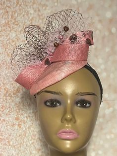 This Pink and brown multicolor Sinamay fascinator is trimmed with veil netting, sinamay bows, and a hatpin.  Make a statement with this gorgeous piece! The hat measures approximately 6 inches in diameter. The hat affixes to the head by a hat elastic/string. Handmade Gifts for mom, sister, wife, or yourself. SHIPPING All items for free shipping will be shipped via USPS FIRST CLASS MAIL. Handmade Gifts For Mom, Sinamay Fascinator, Tea Party Wedding, Sister Wife, Pink And Brown, Tea Parties, Head Covering, First Class, Fascinator