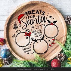 a wooden plate with christmas sayings on it