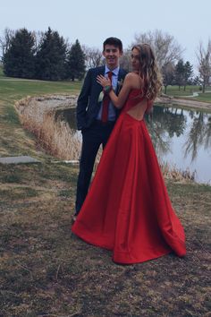 prom pictures prom poses prom couples friends succulent corsages and boutonnieres red dress navy suit blonde hair best friend Red Dress Navy Suit Couple, Prom Photo Poses, Hoco Pictures, Couple Prom, Yellow Homecoming Dresses, Cute Prom Hairstyles