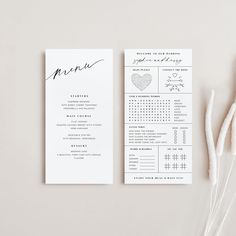 the wedding program is displayed next to some flowers and cotton swabdled with twine