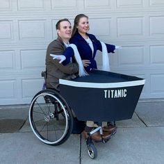 a man in a wheel chair with a woman standing behind him and holding onto the wheels