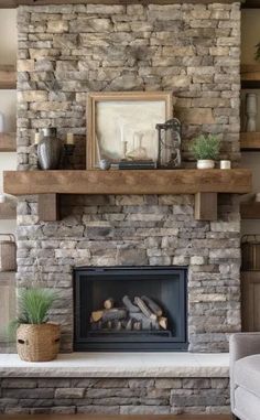 a living room with a stone fireplace and shelves above the fire place in front of it