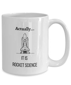 a white coffee mug that says actually it is rocket science