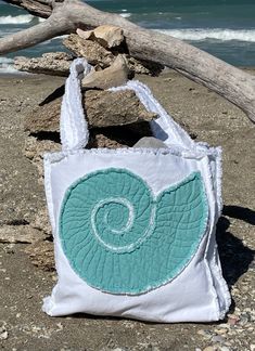 Each Beach Bag is constructed from 100%  Natural Canvas with 5 interior pockets.  All Beach Bags are fully lined, and are machine wash & dry.  Perfect for beach or as a travel tote, easy care and stylish. Beach Tote Bag, Folding Clothes, Bag Ideas, Beach Bags, Beach Tote Bags, Travel Tote, Beach Tote, Nautilus, Beach Bag