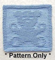 a blue knitted square with the words pattern only on it