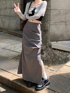 Age: 18-24 years oldSize: S M LFabric: Other/otherPattern: Solid colorStyle: CommutingCommuting: Korean versionWaist type: High waistColor classification: gray blackSkirt type: A-line skirtYear Season: Summer 2022Skirt length: Midi skirtPopular elements/craft: PleatsSilhouette: Type AMaterial composition: Other 100%