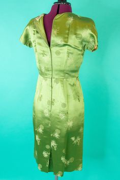 Fitted Silk Vintage Dress For Vintage Fashion, Fitted Vintage Satin Dress, Fitted Retro Satin Dresses, Green Vintage Formal Dress, Fitted Silk Dress For Vintage Fashion, Vintage Fitted Green Dress, Vintage Green Formal Dress, Fitted Silk Vintage Dress, Green Fitted Vintage Dress