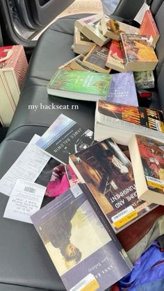 many books are on the back seat of a car