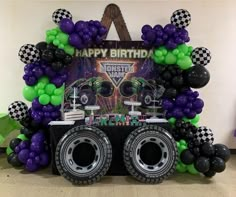 a monster truck birthday party with balloons and decorations