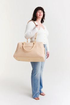 BÉIS 'The Commuter Duffle' In Beige - Beige Duffle Bag & Overnight Bag Weekender Bag With Leather Trim For Everyday Use, Everyday Rectangular Duffle Bag With Leather Trim, Rectangular Weekender Bag With Leather Trim For Everyday Use, Modern Travel Bag With Leather Trim, Versatile Leather Duffle Bag, Versatile Leather Duffle Bag For Daily Use, Versatile Everyday Travel Bag With Zipper Closure, Chic Leather Duffle Bag For Everyday, Functional Leather Duffle Bag For Everyday Use