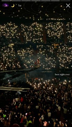 a large group of people holding candles in their hands