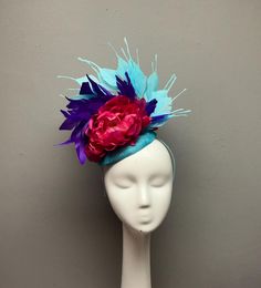 This bold fascinator is perfect for horses races, bridal showers, tea parties, hat luncheons or any other special event.  ► Want it now? Click the "Buy it now" button. ► Love it and want to buy later? Click on the button that says "♥ Favorite" ► Special request/contact me? Click the "Ask a question" link on the right. ► All Sales Are Final. Please contact me before purchasing if you have any questions. ► My shop policies: https://www.etsy.com/shop/tinselandtonic/policy?ref=shopinfo_policies_leftnav Thanks for visiting Tinsel and Tonic!! Please visit my other shops - wrapmeinfur.etsy.com for all your faux fur scarf needs  and abitoftinsel.etsy.com for one of a kind statement jewelry Evening Hat Shaped Headband For Royal Ascot, Evening Headband Fascinator For Kentucky Derby, Kentucky Derby Evening Headband Fascinator, Kentucky Derby Evening Fascinator Headband, Fitted Evening Hair Accessories For Kentucky Derby, Formal Headband For Carnival, Formal Carnival Headband Headpiece, Fitted Headband For Kentucky Derby, Evening Headpiece With Pinched Crown For Kentucky Derby