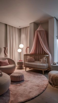 a baby's room with a pink canopy bed, round ottomans and circular rug