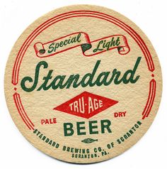 a round coaster with the words standard beer on it