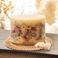 a decorated cake sitting on top of a wooden table