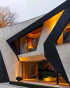 a modern house with an unusual design on the outside