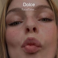 a woman's face with the words dolce on it and an image of her nose