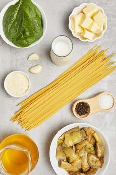 ingredients for pasta laid out on a table