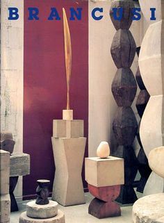 various sculptures are displayed in front of a red wall with the words brancusi on it