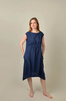 "Linen dress with elastic waist in the front. Women's dress. Dress with side pockets. Midi dress. Soft washed linen. The bottom of the dress is lined with an elastic band in the front and back. Asymmetric bottom. With pockets. Very beautiful and stylish. Comfortable, free-falling product. Belt around. Model wears size S/ 172 cm/5'7\" tall. Made from OEKO - TEX Standard 100 certified European linen fabric which guarantees you that it meets human - ecological standards/ 205 g/m2 GARMENTS ARE DESIGNED FOR 164-176 CM HEIGHT ( 5'5\"-5'9\") PLEASE LEAVE A NOTE WITH YOUR ORDER, IF YOUR HEIGHT DOES NOT FALL IN THIS RANGE. Body measurements: in cm / inch XXS bust: 79-82 cm (30-32\") waist: 62-64 cm (24\"-25\") hips: 84-88 cm (33\"-34\") XS bust: 84-88 cm (33\"-34\") waist: 64-68 cm (25\"-26\") hips Casual Flax Dresses With Pockets, Knee-length Dress With Slip Pockets And Relaxed Fit, Casual Flax Color Relaxed Fit Dress, Linen Dresses With Side Pockets, Linen Dress With Gathered Waist For Daywear, Relaxed Fit Flax Linen Dress With Pockets, Spring Linen Dress With Gathered Waist, Casual Linen Dress With Gathered Waist, Casual Beige Dress