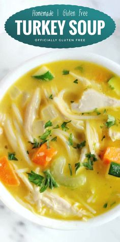 homemade chicken noodle soup in a white bowl on a marble countertop with text overlay