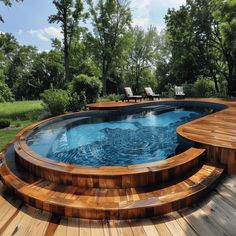 an above ground pool surrounded by wooden steps