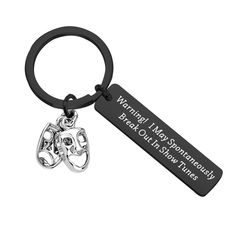 a keychain with a couple's face on it and the words marriage is my